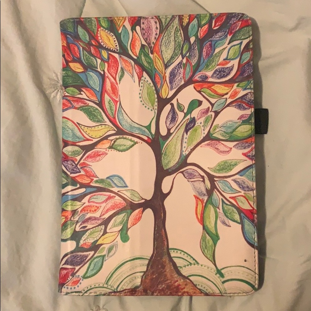 A iPad mini case with a tree